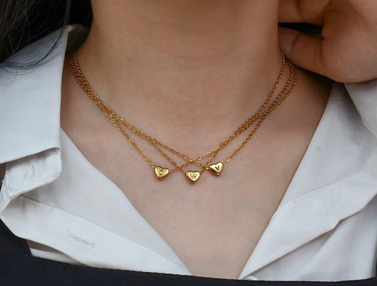 O, W and V letter gold medallions