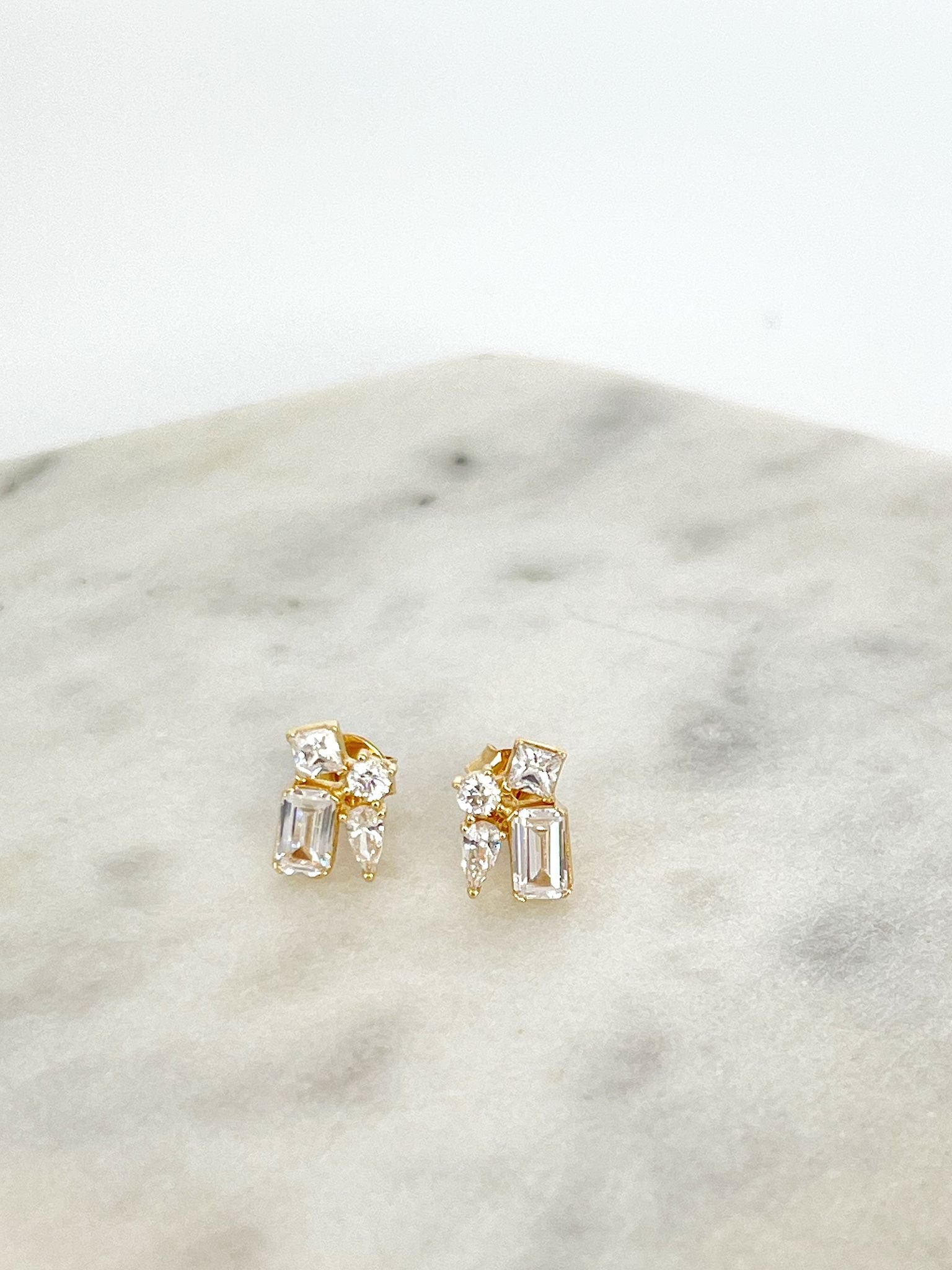 Cristal’s gold earrings