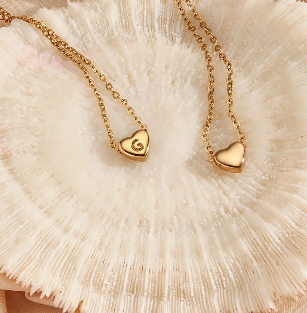 G letter gold medallions, front and back sides